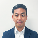 都丸 寿雄 氏